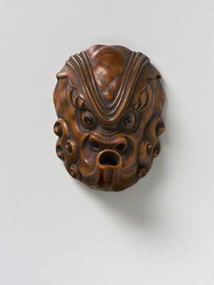 Lot 195 - A JAPANESE MASK NETSUKE OF AN OCTOPUS