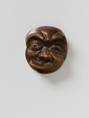Lot 196 - A JAPANESE MASK NETSUKE OF USOBUKI