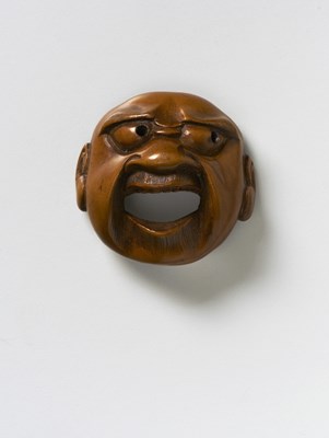 Lot 203 - A JAPANESE MASK NETSUKE OF A WIDE MOUTHED MAN
