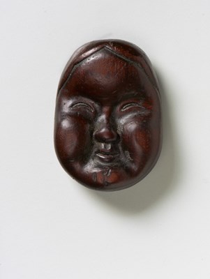 Lot 219 - TWO JAPANESE NETSUKE MASKS OF OTO