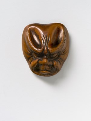Lot 220 - A JAPANESE MASK NETSUKE OF BAKEMONO