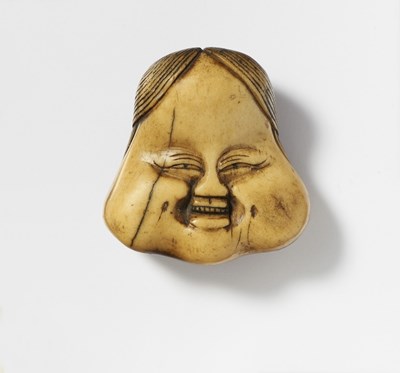 Lot 222 - A JAPANESE MASK NETSUKE OF OKAME