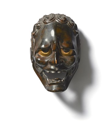 Lot 223 - A JAPANESE MASK NETSUKE OF A DEMON