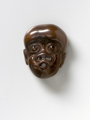 Lot 225 - A JAPANESE MASK NETSUKE OF A SIMIAN MAN