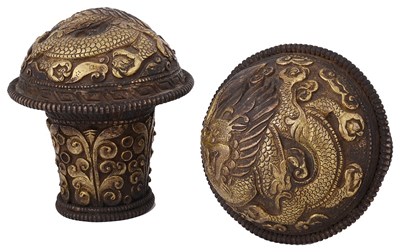 Lot 262 - A PAIR OF PARCEL GILT BRONZE THANG-KA POLE ENDS