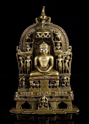 Lot 282 - A JAIN BRONZE SHRINE DEPICTING ADINATHA