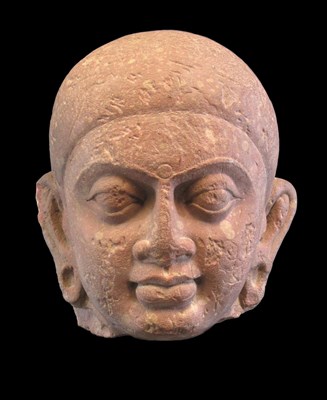 Lot 295 - A MONUMENTAL KUSHAN HEAD OF A JINA