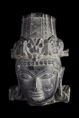 Lot 296 - A LARGE DARK GREY STONE HEAD OF A MALE DEITY