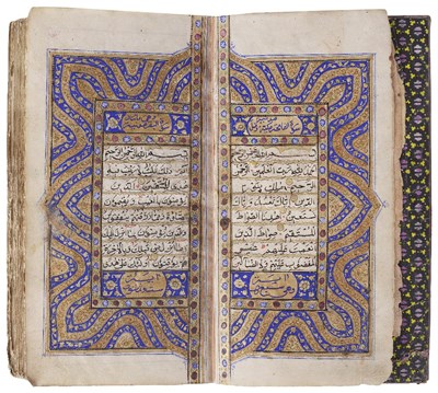 Lot 315 - A LEATHER BOUND EDITION OF THE QUR'AN