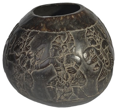 Lot 377 - A CARVED COCONUT SHELL