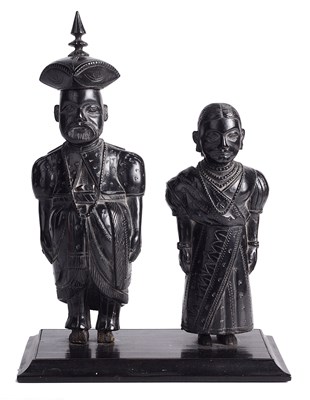 Lot 380 - ~AN EBONY MODEL OF A KANDYAN ROYAL COUPLE