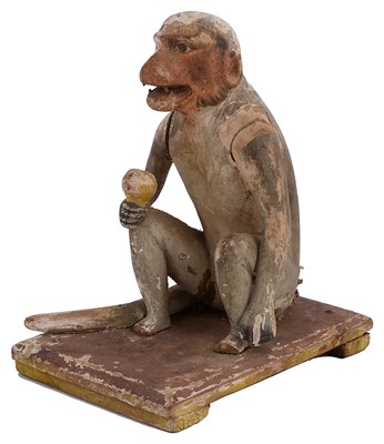 Lot 381 - A PAINTED WOOD FIGURE OF A MONKEY