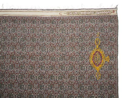 Lot 413 - â€¡ A WOVEN WOOL SHAWL