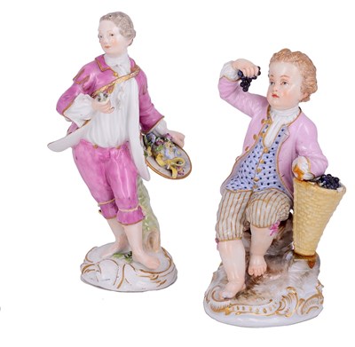 Lot 426 - A MEISSEN FIGURE OF A BOY WITH FLOWERS