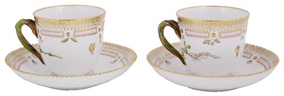 Lot 470 - A PAIR OF ROYAL COPENHAGEN 'FLORA DANICA' CUPS AND SAUCERS
