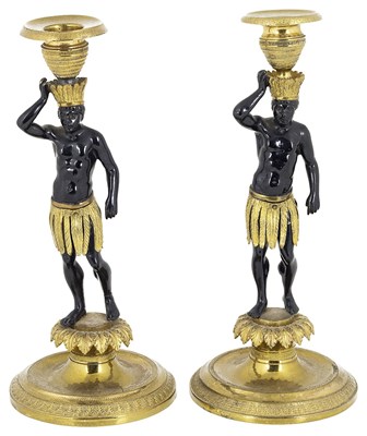 Lot 494 - A PAIR OF GILT-BRONZE BLACKAMOOR FIGURE CANDLESTICKS