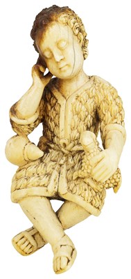 Lot 498 - ~AN INDO-PORTUGUESE IVORY FIGURE OF CHRIST AS THE GOOD SHEPHERD
