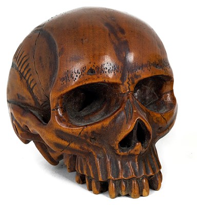 Lot 500 - A BOXWOOD 'VANITAS' MODEL OF A HUMAN SKULL