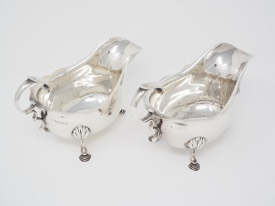 Lot 568 - A PAIR OF GEORGE V SILVER SAUCEBOATS