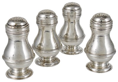 Lot 569 - A SET OF FOUR SILVER BUN PEPPERS