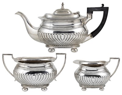 Lot 580 - A GEORGE V SILVER THREE-PIECE TEA SET