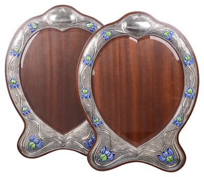 Lot 589 - A LARGE PAIR OF EDWARDIAN SILVER-MOUNTED PHOTOGRAPH FRAMES