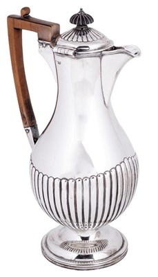 Lot 602 - A VICTORIAN SILVER HOT WATER JUG