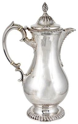 Lot 622 - ~A GEORGE III SILVER HOT WATER JUG
