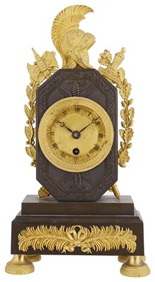 Lot 666 - A FRENCH PARCEL-GILT BRONZE MANTEL CLOCK