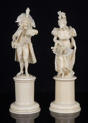 Lot 682 - ~A PAIR OF FRENCH IVORY FIGURES