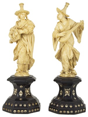 Lot 688 - ~A pair of German ivory figures of 'Malabar Musicians'