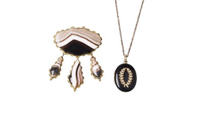 Lot 719 - PEARL AND ENAMEL LOCKET