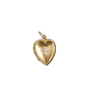 Lot 720 - GOLD AND DIAMOND LOCKET