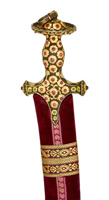 Lot 611 - A HIGHLY DECORATED NORTH INDIAN SWORD (TALWAR) WITH GOLD-ENCRUSTED GEM-SET HILT