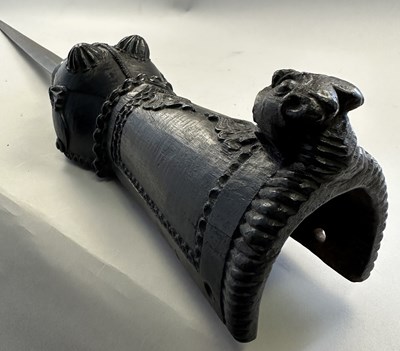 Lot 528 - A FINE SOUTH INDIAN GAUNTLET SWORD (PATA) WITH CARVED WOODEN HILT, 17TH/EARLY 18TH CENTURY, PROBABLY MYSORE, KARNATAKA