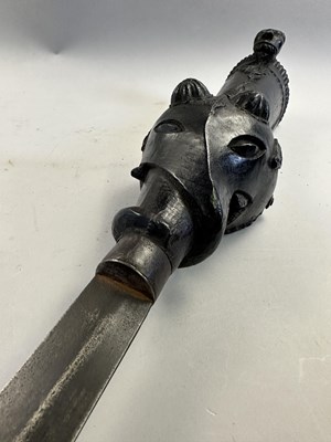Lot 528 - A FINE SOUTH INDIAN GAUNTLET SWORD (PATA) WITH CARVED WOODEN HILT, 17TH/EARLY 18TH CENTURY, PROBABLY MYSORE, KARNATAKA
