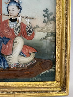 Lot 53 - A CHINESE EXPORT REVERSE GLASS PAINTING OF A MAIDEN PLAYING A FLUTE, QING DYNASTY, 18TH CENTURY