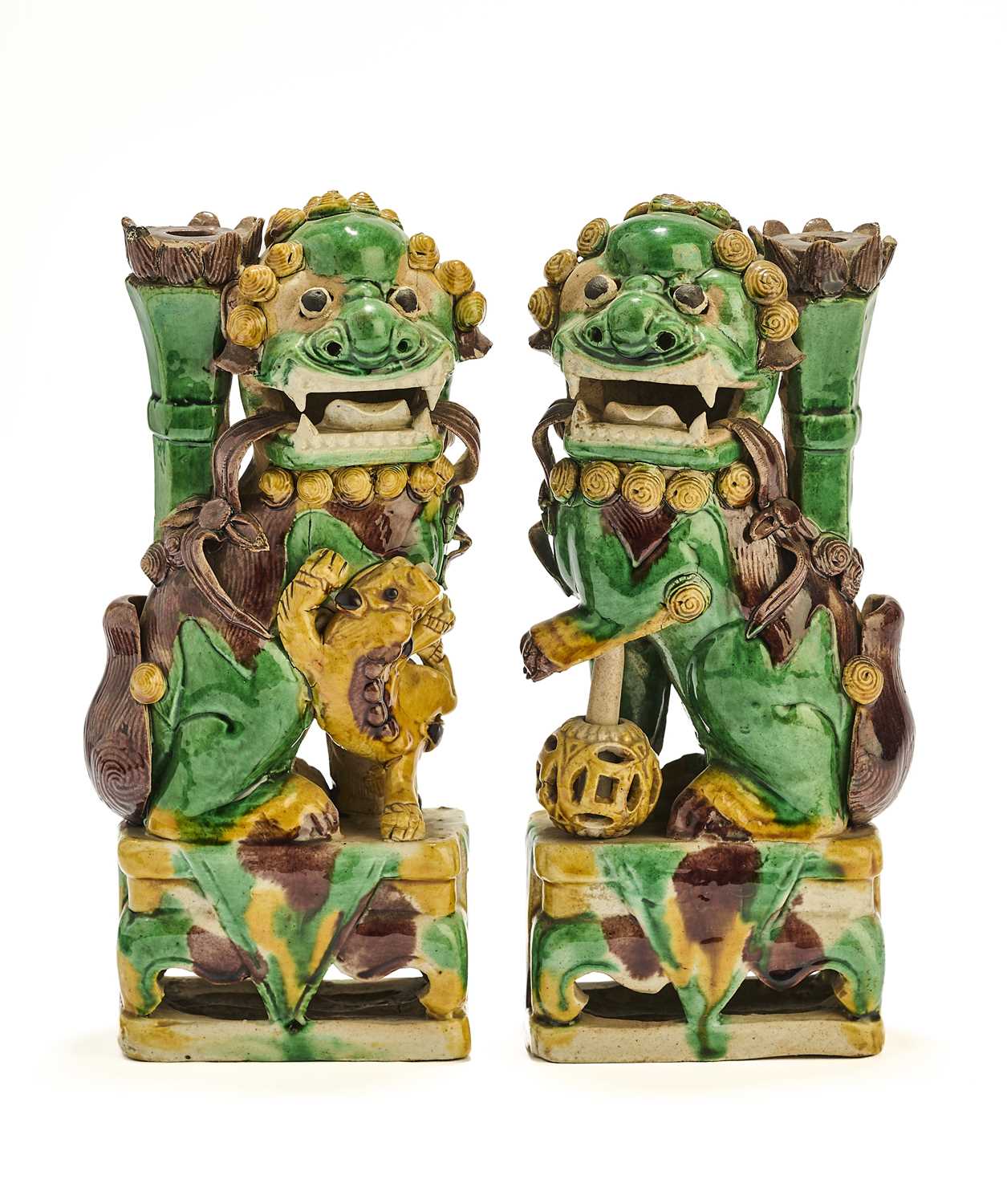 Lot 42 - A PAIR OF CHINESE BISCUIT BUDDHIST LION INCENCE HOLDERS, QING DYNASTY, KANGXI PERIOD (1662-1722)