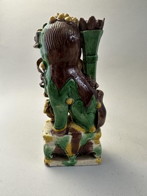 Lot 42 - A PAIR OF CHINESE BISCUIT BUDDHIST LION INCENCE HOLDERS, QING DYNASTY, KANGXI PERIOD (1662-1722)