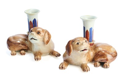 Lot 66 - A PAIR OF CHINESE PUG DOG CANDLE HOLDERS, QING DYNASTY, QIANLONG PERIOD (1736-95)