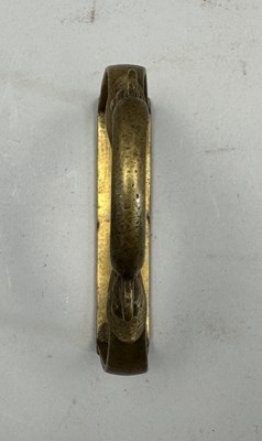 Lot 548 - AN INDIAN COPPER ALLOY STIRRUP AND A PAIR OF INDIAN COPPER ALLOY STIRRUPS, 18TH/19TH CENTURY