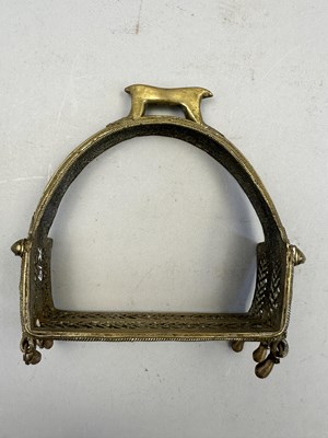 Lot 548 - AN INDIAN COPPER ALLOY STIRRUP AND A PAIR OF INDIAN COPPER ALLOY STIRRUPS, 18TH/19TH CENTURY