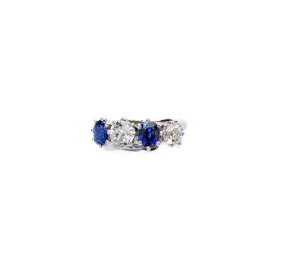 Lot 252 - SAPPHIRE AND DIAMOND HALF HOOP RING