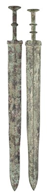 Lot 120 - TWO CHINESE BRONZE SWORDS (JIAN), PROBABLY ZHOU DYNASTY OR EARLY WARRING STATES (1050-221 BC)