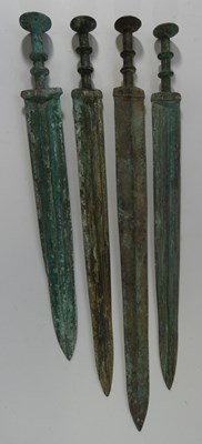 Lot 122 - FOUR SWORDS IN CHINESE ZHOU DYNASTY STYLE