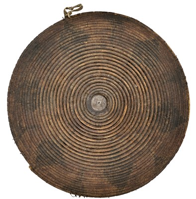 Lot 129 - A RARE TIBETAN CIRCULAR CANE SHIELD, 17TH/18TH CENTURY