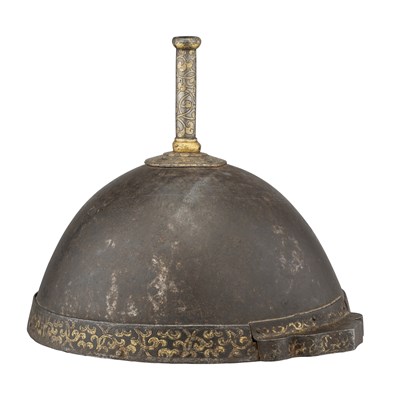 Lot 132 - A DECORATED HIMALAYAN RUSSET IRON HELMET, BHUTAN, 17TH/19TH CENTURY