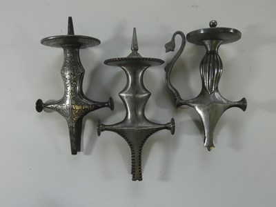 Lot 150 - THREE INDIAN SWORD (TALWAR) HILTS, 19TH CENTURY