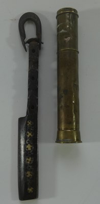 Lot 175 - AN INDIAN IRON TOOL AND A BRASS CANNISTER, LATE 19TH/20TH CENTURY
