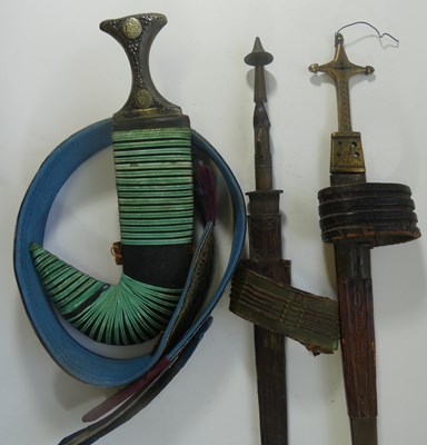 Lot 197 - TWO NORTH AFRICAN ARM DAGGERS, AND OTHER WEAPONS
